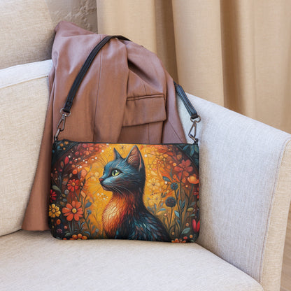 Sac design “Muse Féline” aux motifs floraux éclatants et félin mystique.