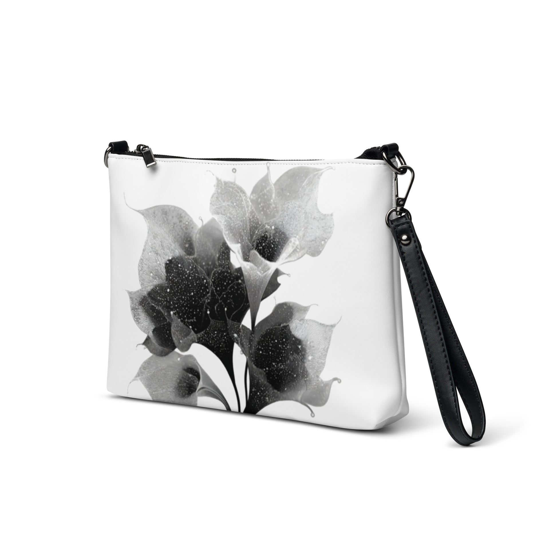 Sac en bandoulière minimaliste avec design floral épuré et détails gris foncé.
