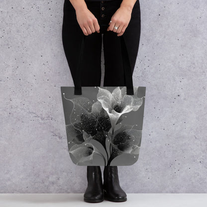Sac tote noir et blanc avec illustration botanique inspirée de l’univers cosmique.