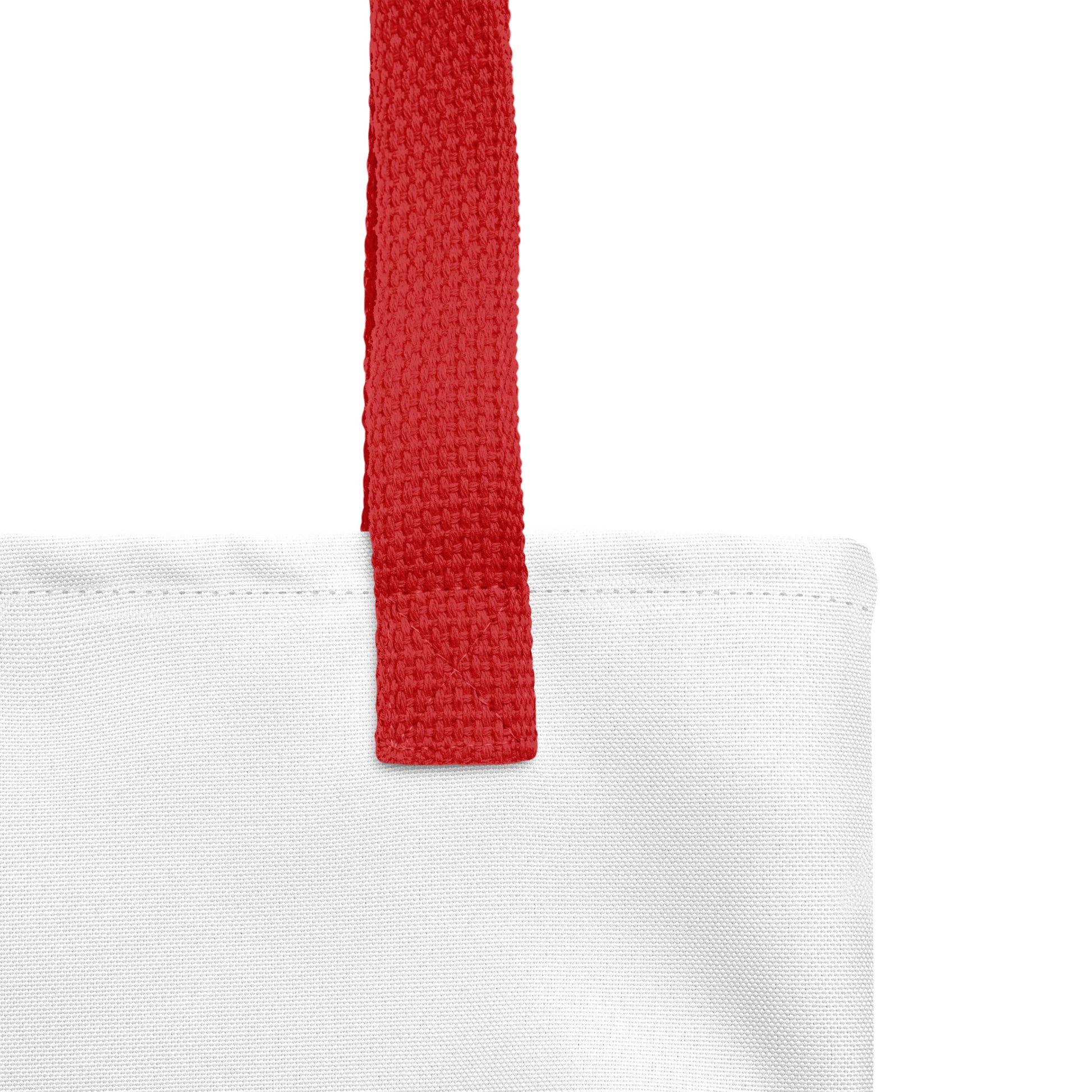 Gros plan des poignées rouges en denim naturel du tote bag Super Rainette 2